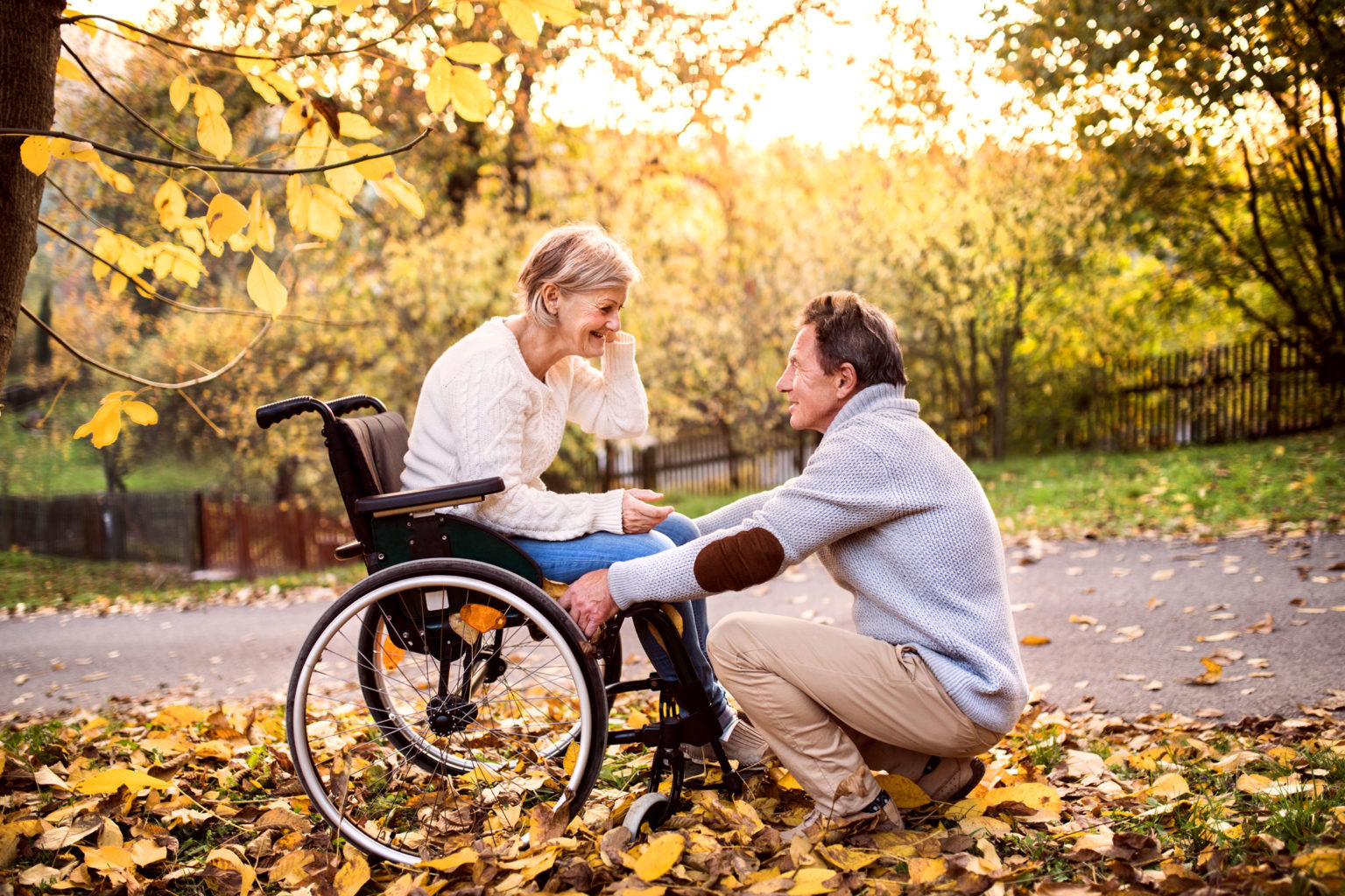 Man with wife in wheelchair